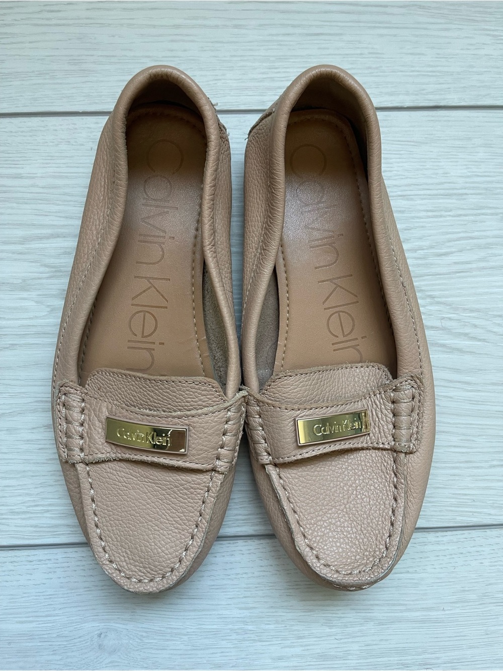 Calvin Klein Nude/Taupe Leather Moccasin Flats with Gold Plaque